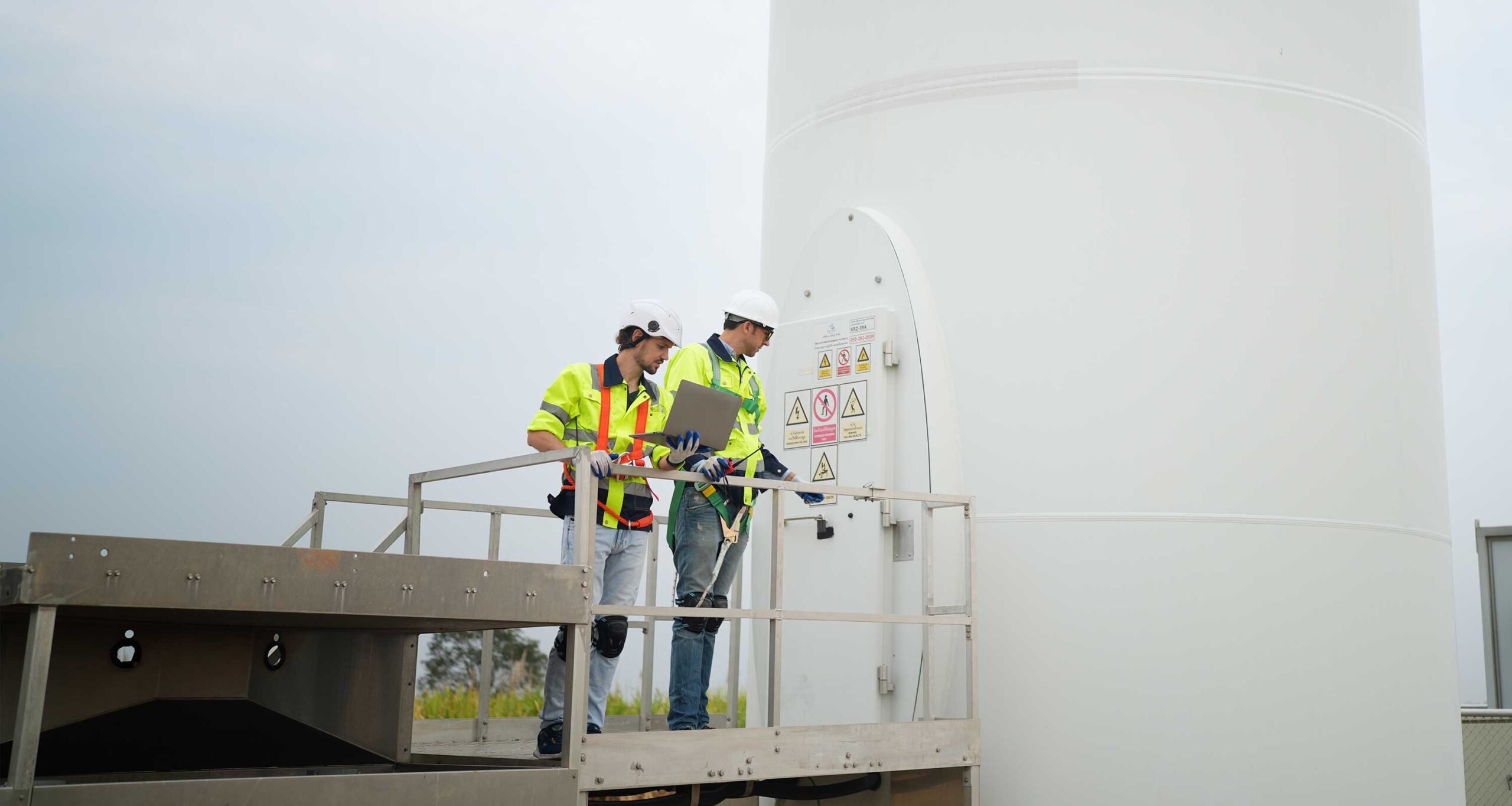 Engineers at wind turbine inspection