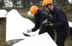 Wind engineers inspecting blade failure small