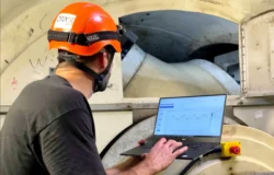 Engineer reviewing pitch bearing data